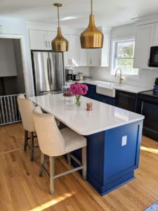 Remodeling a Home with the color blue About Kitchens and Baths